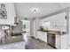 Bright kitchen with white cabinetry, stainless steel appliances, and modern countertops at 182 Jesse Dr, Smithfield, NC 27577