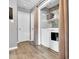Functional laundry room with white washer and dryer and additional storage at 182 Jesse Dr, Smithfield, NC 27577