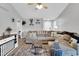 Spacious living room with a large sectional sofa, a ceiling fan and laminate floors at 182 Jesse Dr, Smithfield, NC 27577
