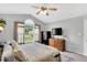 Bright main bedroom featuring vaulted ceiling, neutral tones, and large window offering ample natural light at 182 Jesse Dr, Smithfield, NC 27577