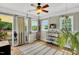 Bright sunroom with wooden floors and multiple windows at 182 Jesse Dr, Smithfield, NC 27577