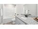 Bathroom featuring modern fixtures and granite counter at 185 Millwood Dr, Clayton, NC 27527