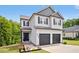 Attractive two-story home with a two-car garage, showcasing a stylish exterior at 185 Millwood Dr, Clayton, NC 27527