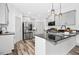 Gourmet kitchen with granite counters, stainless appliances, and ample cabinet space at 185 Millwood Dr, Clayton, NC 27527