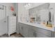 Bright bathroom with double sinks, storage and a large mirror at 191 Enterprise Dr, Clayton, NC 27520