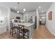Modern kitchen featuring stainless steel appliances, a center island, and an inviting layout at 191 Enterprise Dr, Clayton, NC 27520