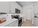 Well-equipped kitchen with sleek appliances, ample counter space, and modern finishes at 191 Enterprise Dr, Clayton, NC 27520