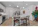 Stylish kitchen with stainless steel appliances, a quartz island, and an open layout at 191 Enterprise Dr, Clayton, NC 27520