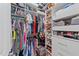 Bright, well-organized walk-in closet with shelving and ample storage for clothes, shoes, and personal items at 191 Enterprise Dr, Clayton, NC 27520