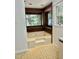 Inviting tub with wood accents and natural light from the surrounding windows at 192 Misty Hollow Rd, Timberlake, NC 27583