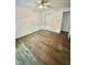 Bedroom featuring wood-look flooring, a ceiling fan and a closet at 192 Misty Hollow Rd, Timberlake, NC 27583