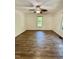 Spacious bedroom with hardwood floors, ceiling fan, and plenty of natural light at 192 Misty Hollow Rd, Timberlake, NC 27583