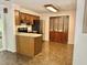 Charming kitchen featuring wood cabinets, modern appliances, and an adjacent dining area at 192 Misty Hollow Rd, Timberlake, NC 27583