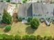 Aerial view of the home showing the backyard, patio, green space and privacy fence at 201 Mayfield Dr, Apex, NC 27539