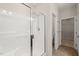 Shower with white subway tiles and glass doors at 201 Mayfield Dr, Apex, NC 27539