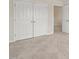Bright bedroom contains carpet, a large closet, and is conveniently located next to another room at 201 Mayfield Dr, Apex, NC 27539