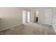 Spacious bedroom features neutral carpet, multiple doors and outlets, and is move-in ready at 201 Mayfield Dr, Apex, NC 27539