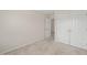 This carpeted bedroom includes a closet and is located conveniently by another room at 201 Mayfield Dr, Apex, NC 27539