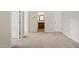 The bedroom features ensuite bathroom, neutral carpet, and a bright airy feel at 201 Mayfield Dr, Apex, NC 27539