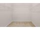 Walk-in closet with white wire shelving at 201 Mayfield Dr, Apex, NC 27539