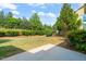 Relax and enjoy the lovely wooded views from this spacious patio at 201 Mayfield Dr, Apex, NC 27539
