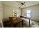 Dining room featuring tile flooring and a view to the kitchen with natural light from a window at 211 Webb St, Roxboro, NC 27573