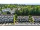 Overhead view of townhomes featuring assigned parking, close to green space, and traditional architecture at 2713 Wyntercrest Ln, Durham, NC 27713