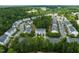 An aerial view showcasing the neighborhood's layout, mature trees, and well-maintained surroundings at 2713 Wyntercrest Ln, Durham, NC 27713