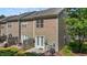 Townhome backyard patio with fenced space, exterior siding, and private outdoor seating area at 2713 Wyntercrest Ln, Durham, NC 27713