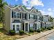 Charming townhome exterior with well-maintained landscaping, multiple windows, and traditional design at 2713 Wyntercrest Ln, Durham, NC 27713