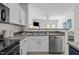 Contemporary kitchen with white cabinets and sleek countertops at 2713 Wyntercrest Ln, Durham, NC 27713