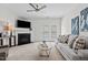 Comfortable living room with a fireplace and access to the patio at 2713 Wyntercrest Ln, Durham, NC 27713
