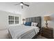 Spacious primary bedroom with vaulted ceiling, ceiling fan, and large window at 2713 Wyntercrest Ln, Durham, NC 27713