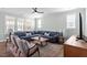 Inviting living room with plush seating, hardwood floors, and natural light at 2919 Winter Crop Way, Apex, NC 27502