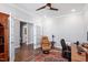 Well-appointed office with hardwood floors, French doors, and ample workspace at 2919 Winter Crop Way, Apex, NC 27502