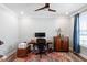 Bright office space featuring a ceiling fan, hardwood floors with a rug, and a window at 2919 Winter Crop Way, Apex, NC 27502