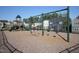Community playground featuring a slide and swings, surrounded by wood chips and fencing at 2919 Winter Crop Way, Apex, NC 27502