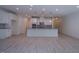 Modern kitchen with white cabinets, granite countertops, and stainless steel appliances at 311 Alamosa Pl, Cary, NC 27519