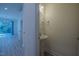 Charming powder room featuring a pedestal sink and updated fixtures at 311 Alamosa Pl, Cary, NC 27519