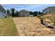 View of the backyard showing the size of the lot and neighboring homes at 332 Bishop Ln, Sanford, NC 27330