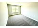 Bedroom with neutral carpet and a window at 332 Bishop Ln, Sanford, NC 27330