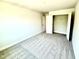 Bedroom with carpet, open closet and neutral paint color at 332 Bishop Ln, Sanford, NC 27330