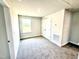 A bright bedroom with neutral walls, carpet and a window with a nice view at 332 Bishop Ln, Sanford, NC 27330