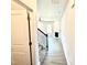 Inviting foyer with staircase leading to the main floor, and entry to the living room at 332 Bishop Ln, Sanford, NC 27330