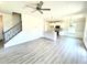 Open-concept living space with updated kitchen and staircase at 332 Bishop Ln, Sanford, NC 27330