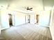 Spacious carpeted main bedroom with walk-in closet and an ensuite bathroom at 332 Bishop Ln, Sanford, NC 27330