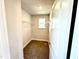 Bright walk-in closet features a window and metal shelving for storage and organization at 332 Bishop Ln, Sanford, NC 27330