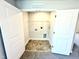 Large walk-in closet with open shelving, tile floor and room for storage at 332 Bishop Ln, Sanford, NC 27330