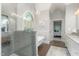 Well-lit bathroom featuring a soaking tub, glass shower, and modern fixtures at 3440 Black Bear Cv, Burlington, NC 27215