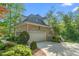 Brick home with two-car garage and mature landscaping at 3440 Black Bear Cv, Burlington, NC 27215